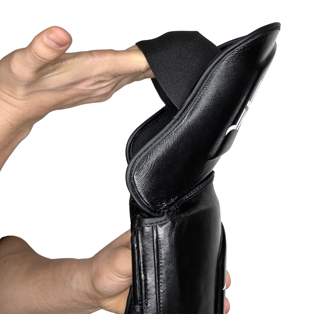 ESPINILLERAS PIEL REAL · PROTECCIÓN TIBIA Y EMPEINE · EDICIÓN LIMITADA