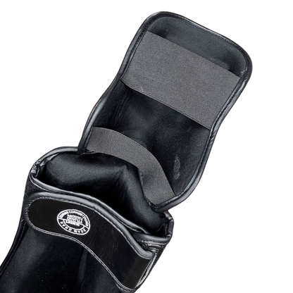 ESPINILLERAS PIEL REAL · PROTECCIÓN TIBIA Y EMPEINE · EDICIÓN LIMITADA